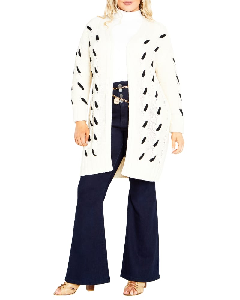 Front of a model wearing a size 18/20 CARDI LACEY CABLE in Ivory / Black by Aveology. | dia_product_style_image_id:318132